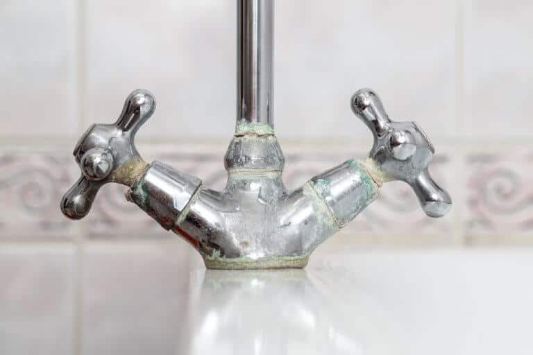 Avoid hard water build up on faucets with a whole house water softener system