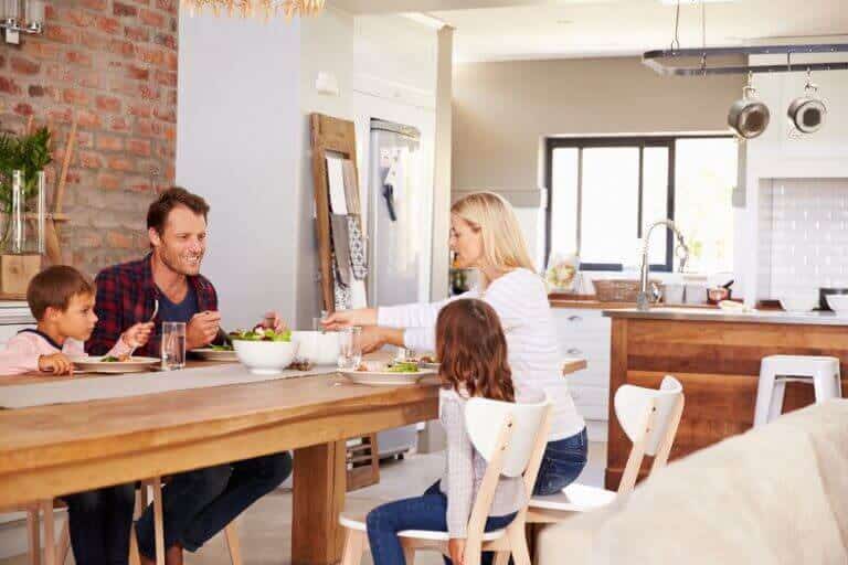Family enjoying healthier dinner and water from Home Water Softener system